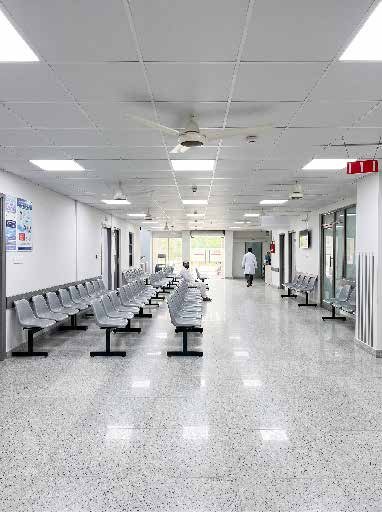 Bright, modern patient waiting corridor inside IBN E SEENA Hospital Complex